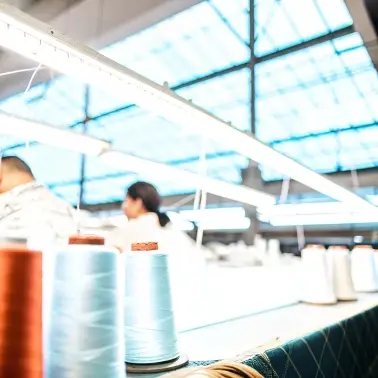 Thread for garments Spools of thread in a clothing factory, high-quality materials for production.