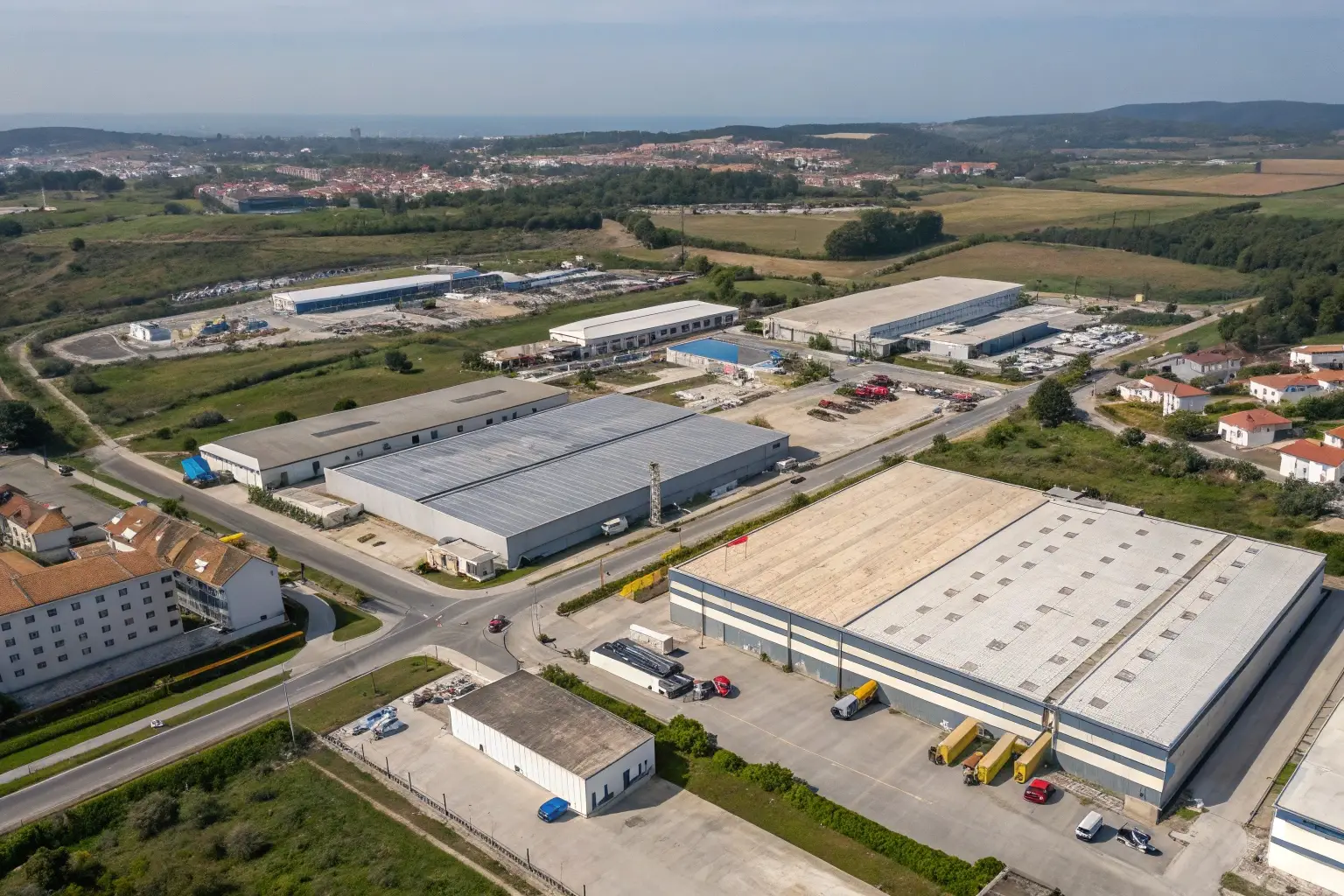 Aerial view of an industrial manufacturing and logistics zone.