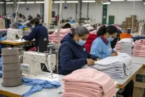 an-image-of-workers-in-a-clothing-factory-assembl
