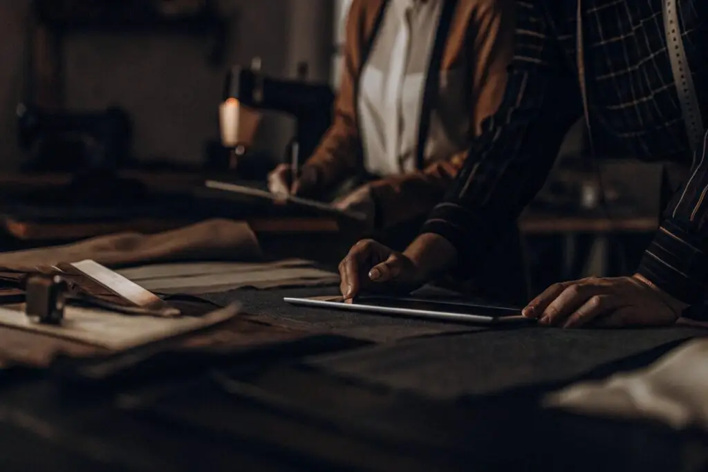 Modern fashion design studio where designers sketch apparel concepts