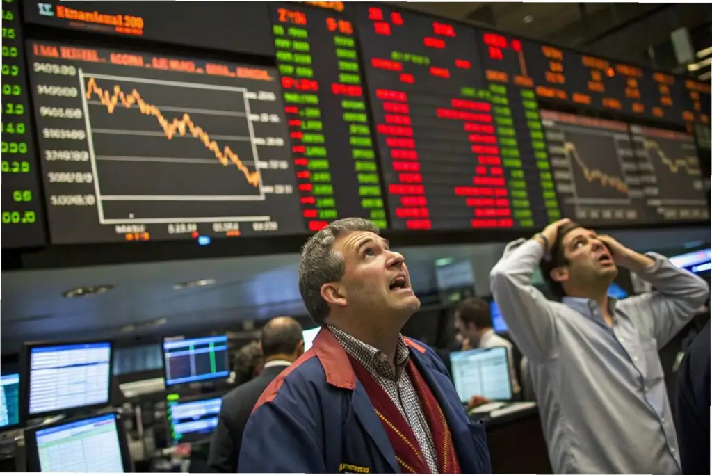 Traders reacting to a market crash with falling stock prices