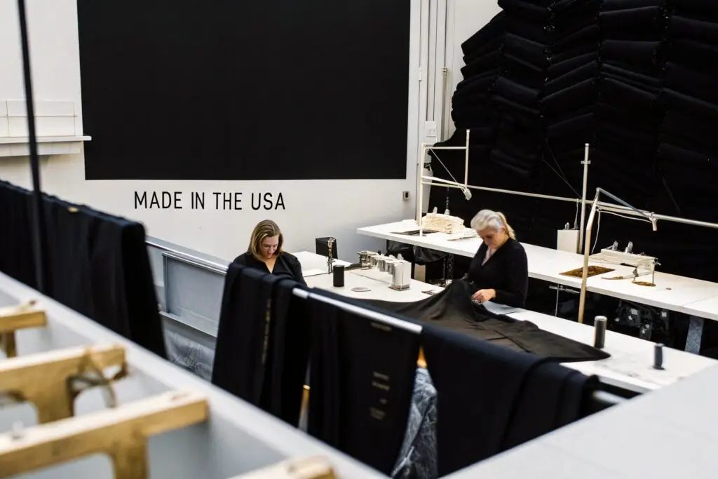 Modern garment manufacturing facility with skilled workers, ensuring precision and quality.