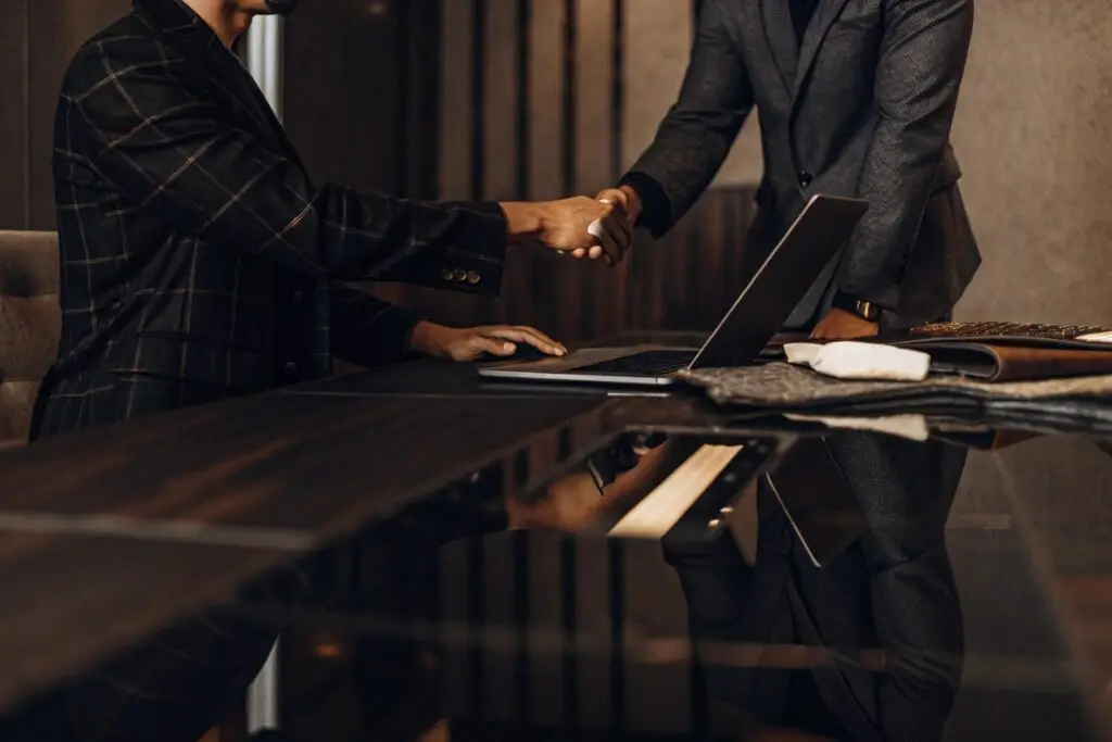 Professional business meeting between a fashion supplier and a buyer