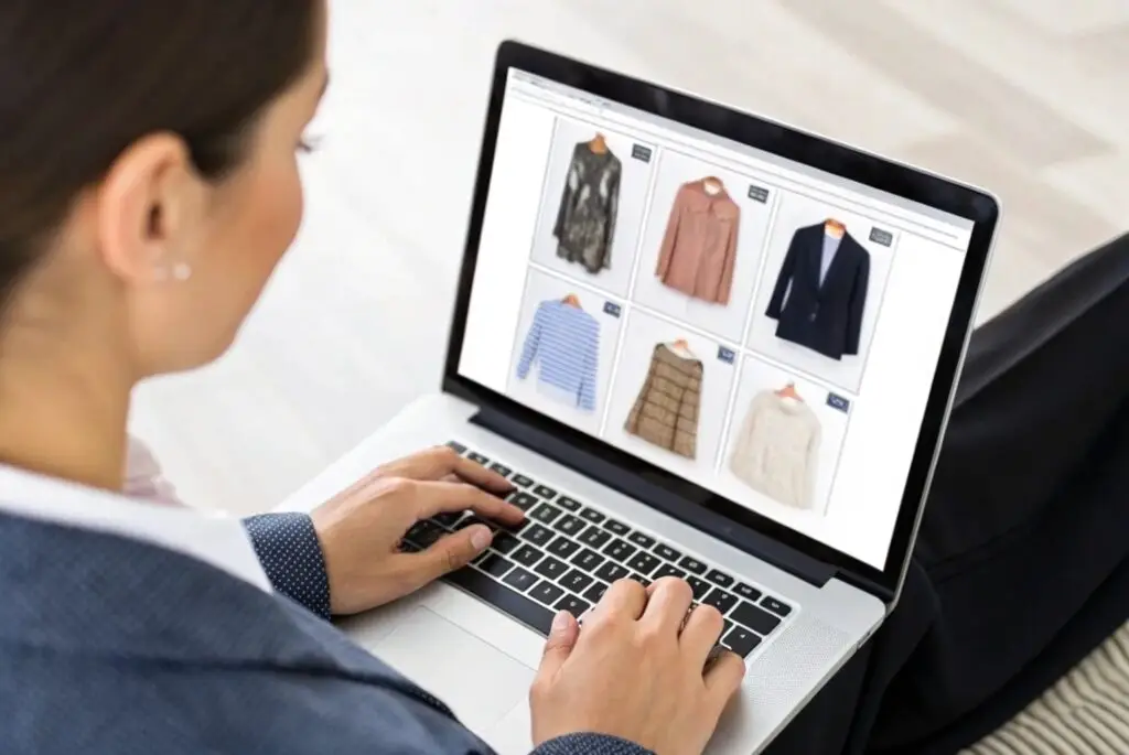 Business owner reviewing apparel online