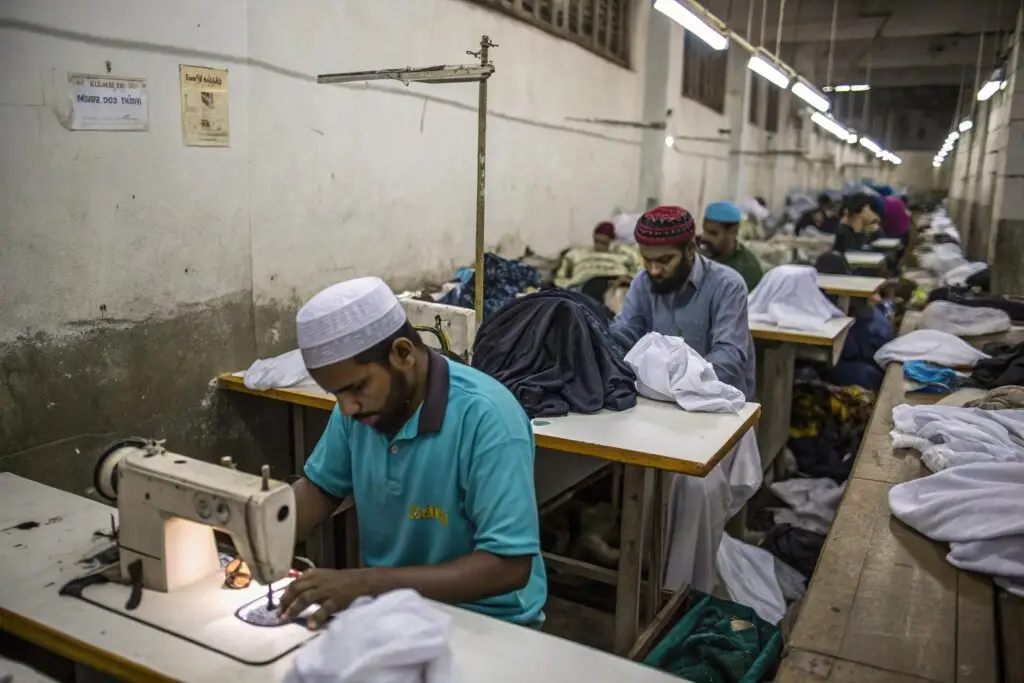 Workers sewing garments in a garment factory