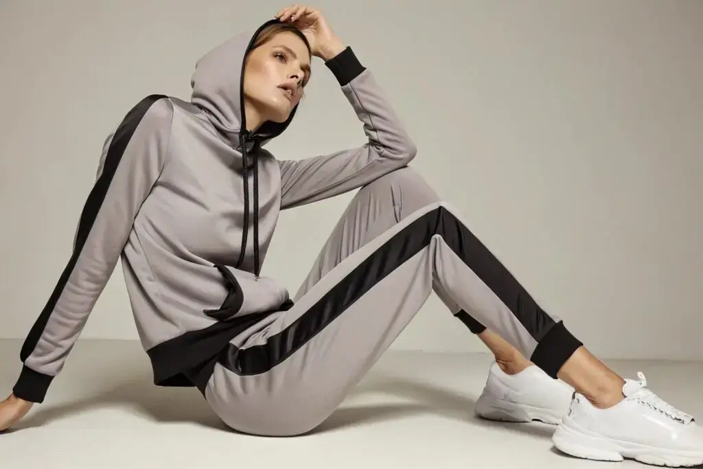 Model wearing a spandex blend tracksuit