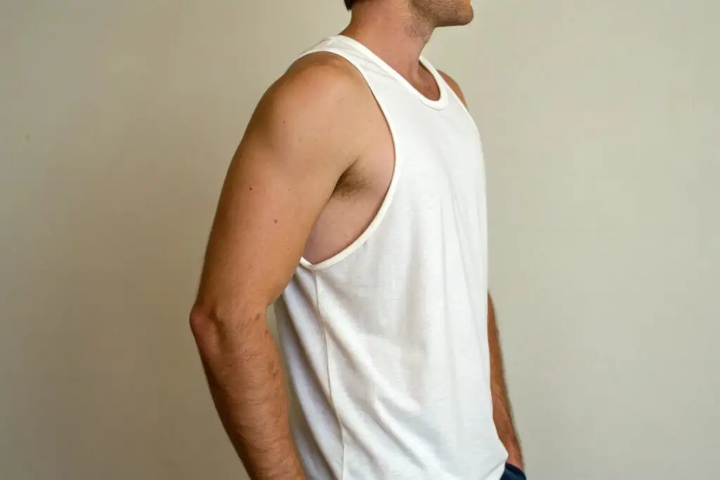 Man in white muscle tank top