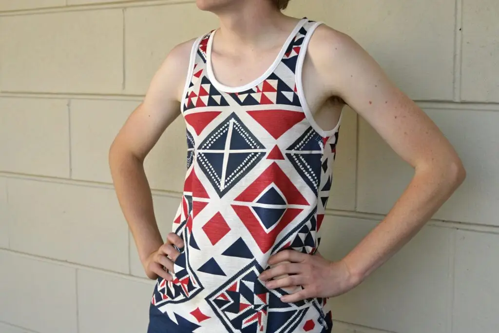 Man in graphic print tank top with geometric design