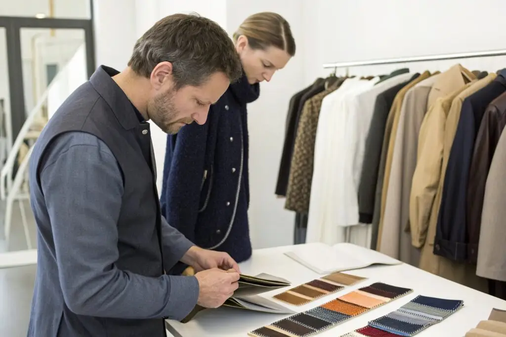 European clothing buyer inspecting product samples