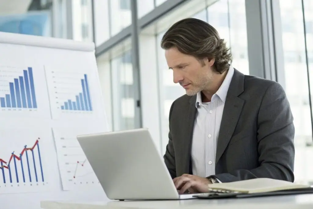 European fashion industry professional reviewing market analysis