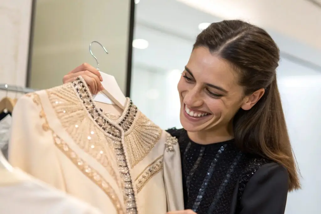 Fashion customer admiring luxury dress