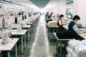 How Can Grouped Fabric Buying Improve Industrial Apparel Sourcing?